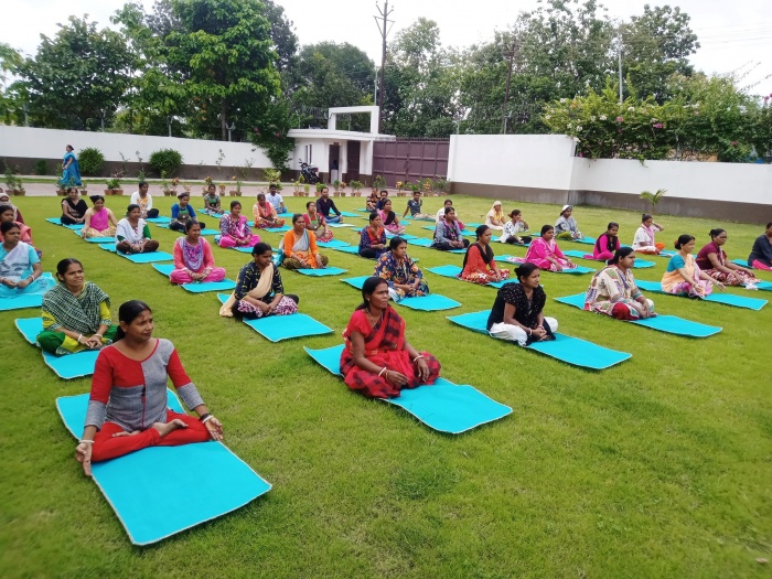 Garment Workers doing Yoga outside the factory 